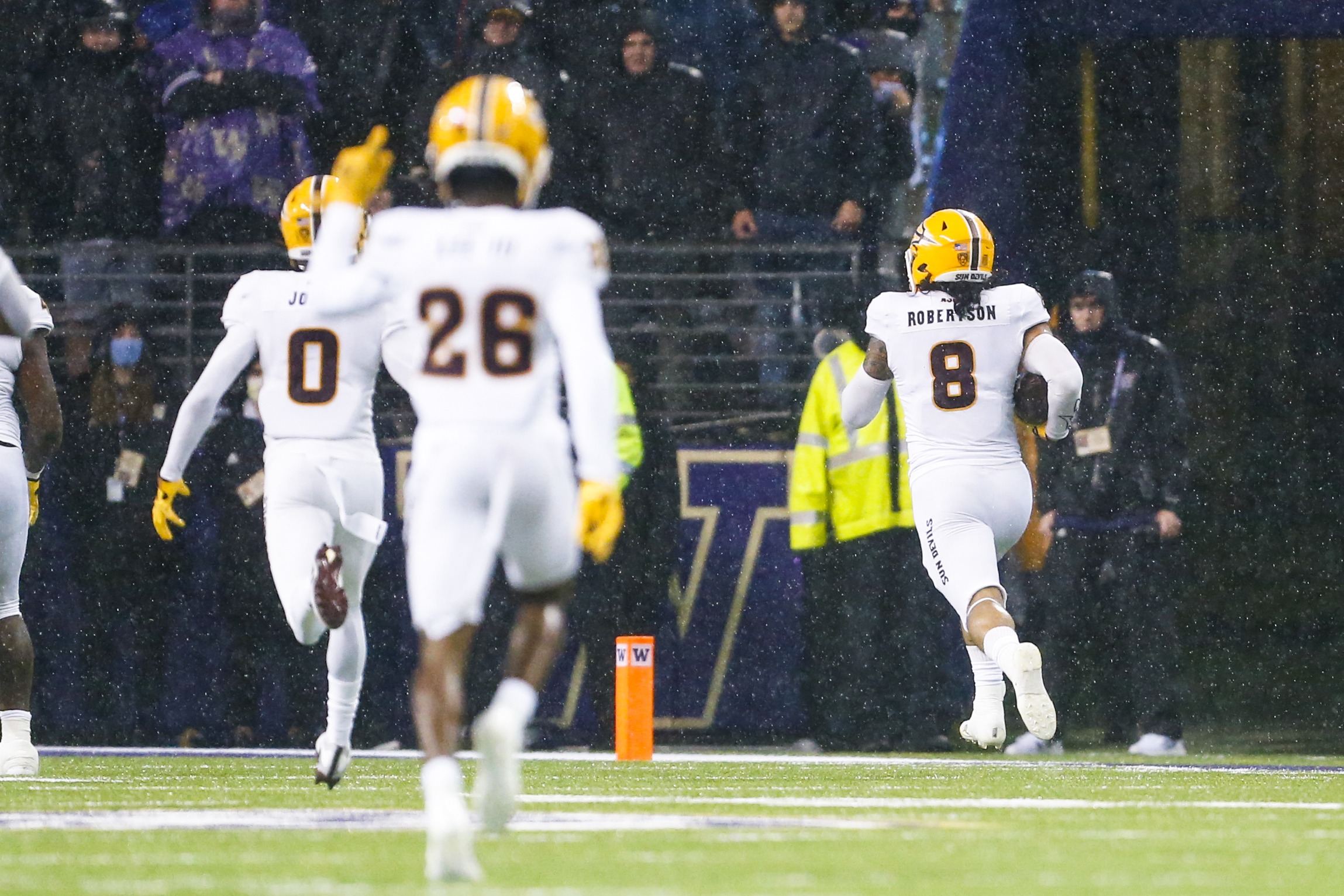 Arizona State Sun Devils defensive back Merlin Robertson returns an interception for a touchdown late in the game to seal the win for ASU. 