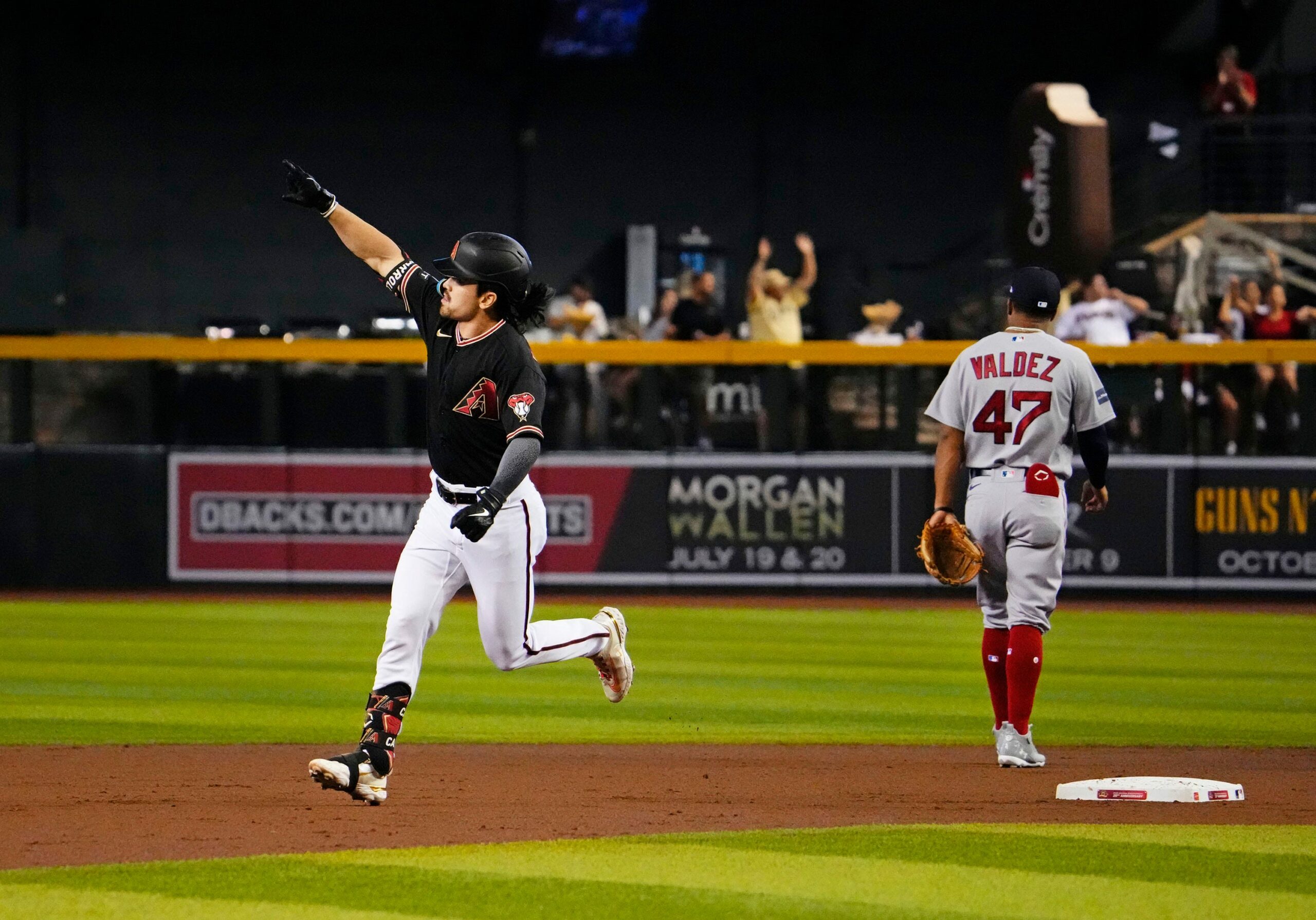 Diamondbacks All-Star candidate Corbin Carroll hits a two-run home run against the Boston Red Sox in the first inning at Chase Field.